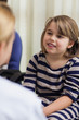 Cute girl sitting in a waiting room