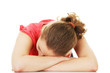Foto: Girl with red hair sleeping on the table Girl with red hair sleeping on the table