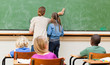 Photo : Back view of teacher and pupil wiping the blackboard Back view of teacher and pupil wiping the blackboard