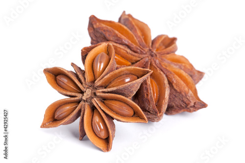 Photo: Anise star (Illicium verum) isolated on white background. Anise star (Illicium verum) isolated on white background.
