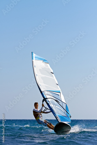 Photo: Fast approaching windsurfer Fast approaching windsurfer