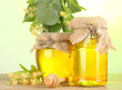 jars with linden honey and flowers