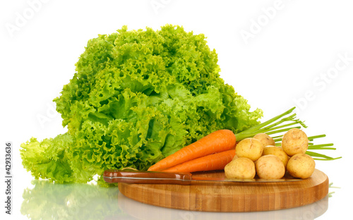 Foto: young potatoes, lettuce and carrots young potatoes, lettuce and carrots
