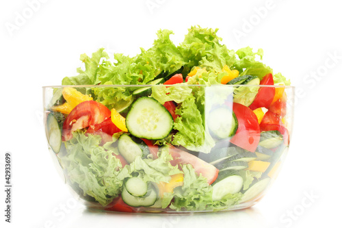 Photo: fresh vegetable salad in transparent bowl isolated on white fresh vegetable salad in transparent bowl isolated on white