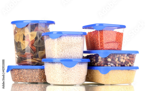 Photo: Filled plastic containers isolated on white Filled plastic containers isolated on white