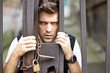 Photo: Man behind bars Man behind bars