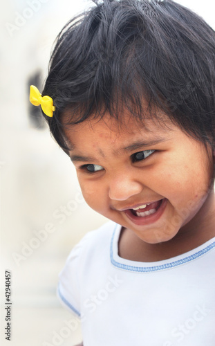 Foto: Photo of beautiful and blissful indian baby girl with expressive Photo of beautiful and blissful indian baby girl with expressive