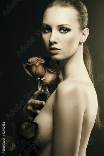 Photo: gilr's low key portrait with roses in the right hand gilr's low key portrait with roses in the right hand