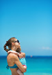 Photo: Mother hugging baby on beach Mother hugging baby on beach