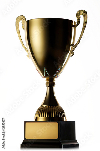 Photo: golden cup of the winner isolated on white background golden cup of the winner isolated on white background