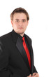 Photo: Young businessman in black formal suit Young businessman in black formal suit
