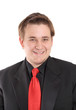 Photo: Young businessman in black suit smiling Young businessman in black suit smiling