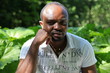 Young african business-manin white shirt, outdoors