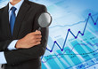 Photo: man holding magnifying glass man holding magnifying glass