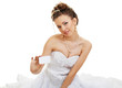 bride holds out card