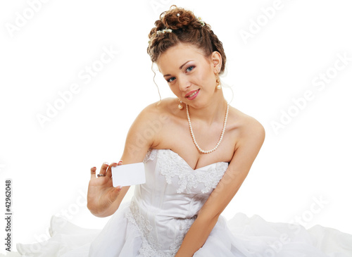 Photo: bride holds out card bride holds out card