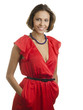 Beautiful smiling young woman in red dress