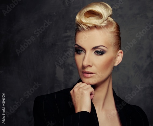 Photo: Fashionable woman with creative hairstyle Fashionable woman with creative hairstyle