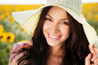 Beautiful lady in sunflower field