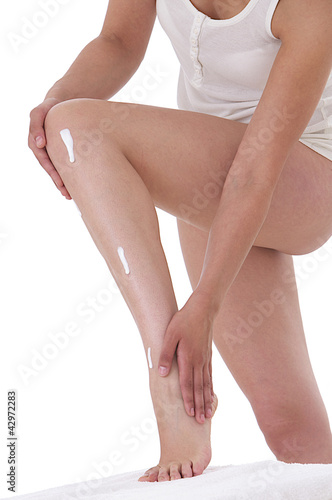 Photo: Crème - Massage de la cheville Crème - Massage de la cheville
