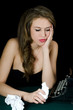 The beautiful girl at a typewriter. A retro style