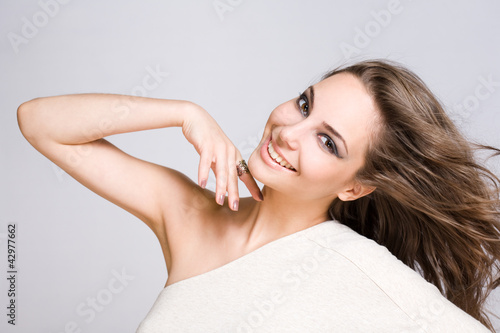Photo: Fashionable young brunette beauty. Fashionable young brunette beauty.