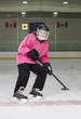 Ringette Skater in Action at Rink