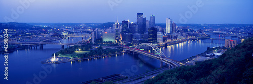 Photo: Panoramic evening view of Pittsburgh, PA with West End Bridge, and Allegheny, Monongahela and Ohio Rivers Panoramic evening view of Pittsburgh, PA with West End Bridge, and Allegheny, Monongahela and Ohio Rivers
