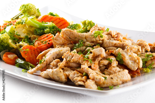 Foto: Roasted meat and vegetables Roasted meat and vegetables