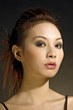 Studio shot of a lady with makeup and hairdo