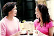 A mother and daughter in a cafe 