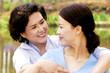 A mother and a daughter in a park 