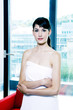 Woman in towel in the living room 