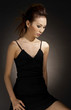 Woman in black dinner dress