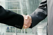 A handshake between two businessmen 
