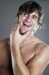 Man checking his beard 