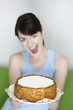 Woman holding a cake