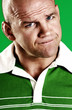 Bald man furrowing brows