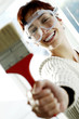 Photo: Woman with goggles holding a paintbrush Woman with goggles holding a paintbrush