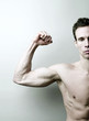 Photo: Man showing off his muscle Man showing off his muscle
