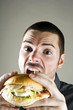 Man eating burger