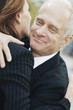 Businessman giving his client a hug