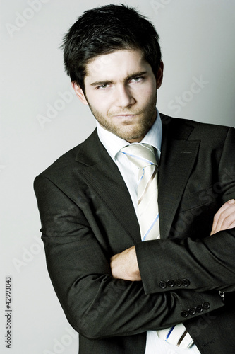 Photo: Businessman showing his dissatisfied look Businessman showing his dissatisfied look