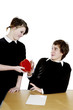 Boy rejecting a lovely gift from his admirer