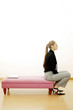 Businesswoman sitting on the edge