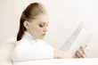Attractive businesswoman reading