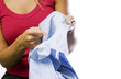Woman showing a lipstick stain on a shirt collar