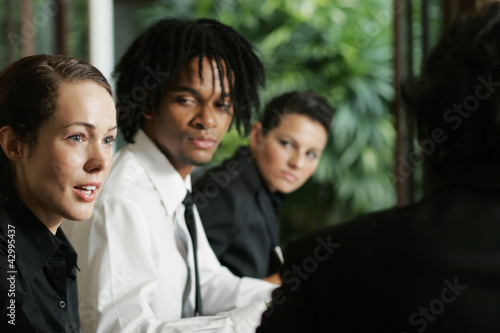 Photo: Businesswoman speaking up in a meeting Businesswoman speaking up in a meeting