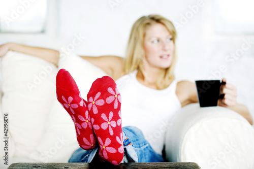 Photo: Mature lady wearing a pair of red flowery sock Mature lady wearing a pair of red flowery sock
