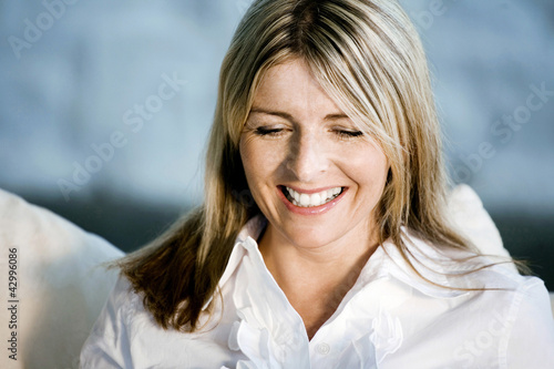 Photo: A business lady smiling A business lady smiling